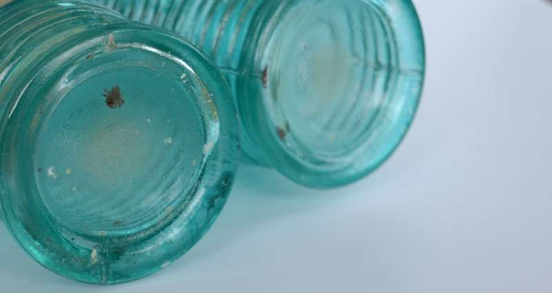 Pair of Ribbed Turquoise Collectable Bottles