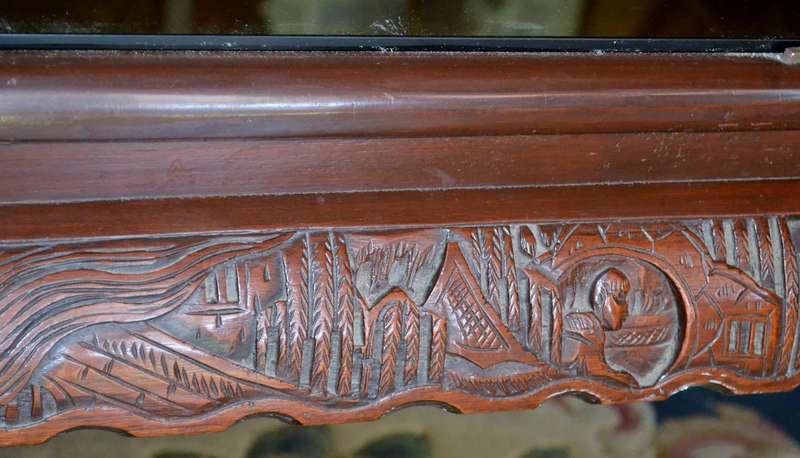 Chinese Oval Coffee Table with Carved Battle Scene