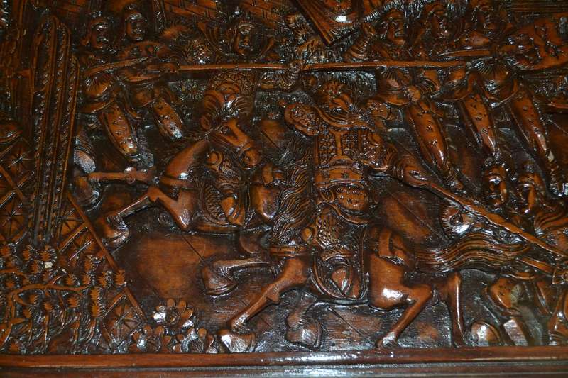 Chinese Oval Coffee Table with Carved Battle Scene