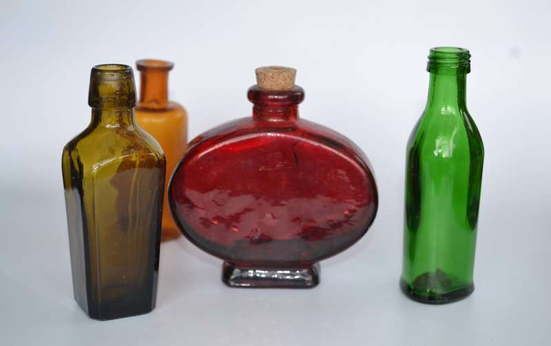 Selection of Four assorted collectable bottles