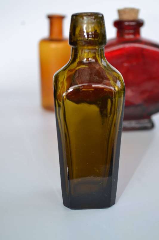 Selection of Four assorted collectable bottles