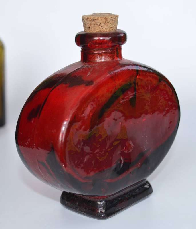 Selection of Four assorted collectable bottles