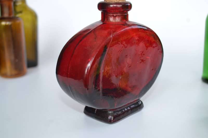 Selection of Four assorted collectable bottles