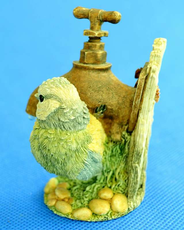 A Pair of Small Resin Bird Ornaments by CA