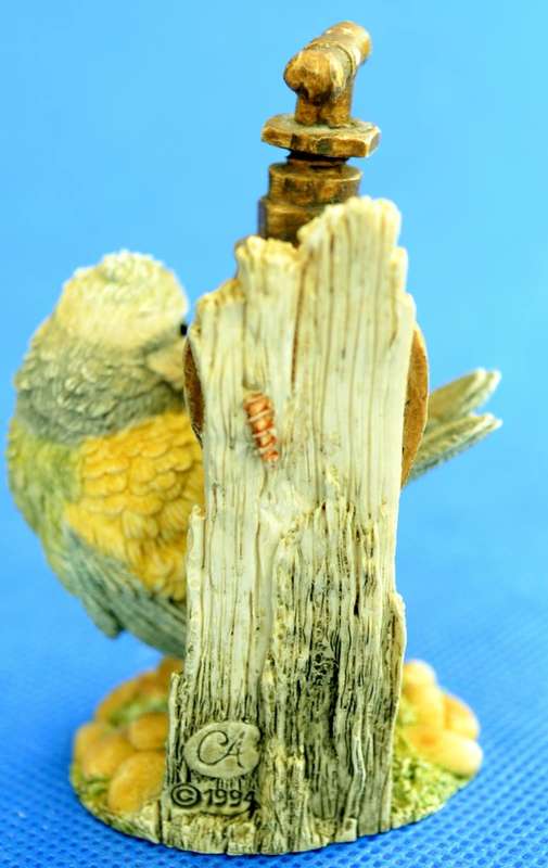 A Pair of Small Resin Bird Ornaments by CA