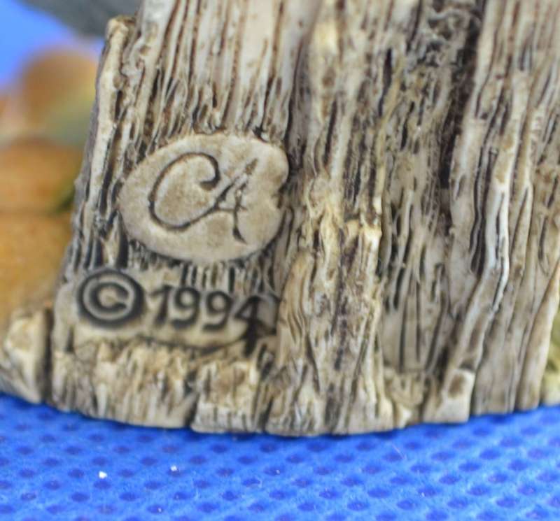 A Pair of Small Resin Bird Ornaments by CA