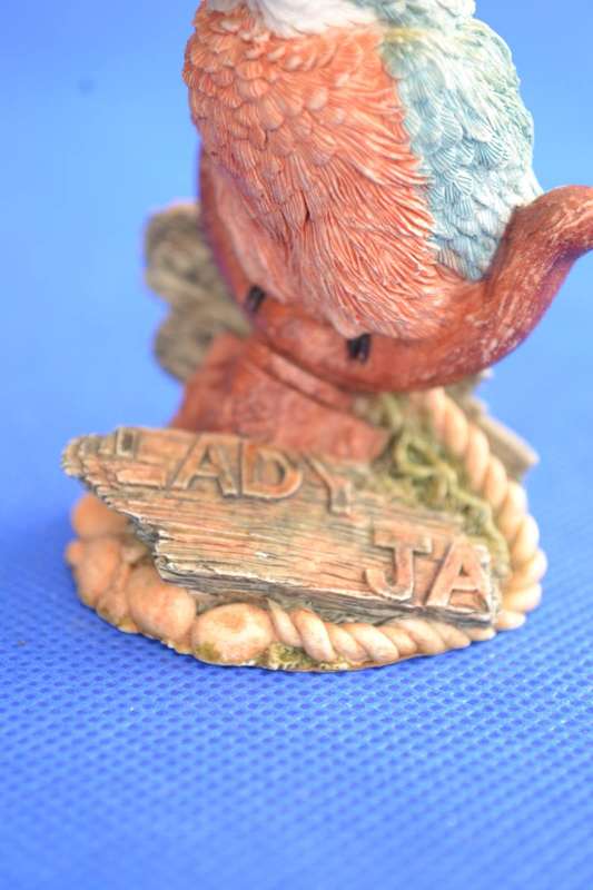 A Pair of Small Resin Bird Ornaments by CA