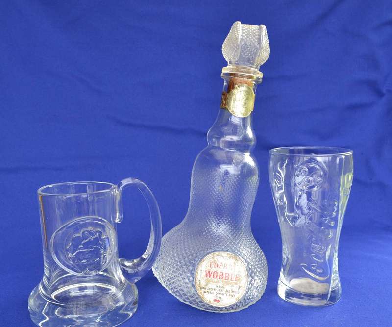 Magazzin Wobble Bottle Decanter Bottle and 2 branded Glass Glasses