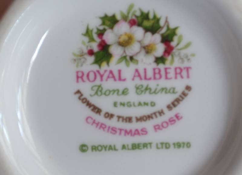 Royal Albert Flower of the Month "December"  Tea Cup and Aynsley Saucer