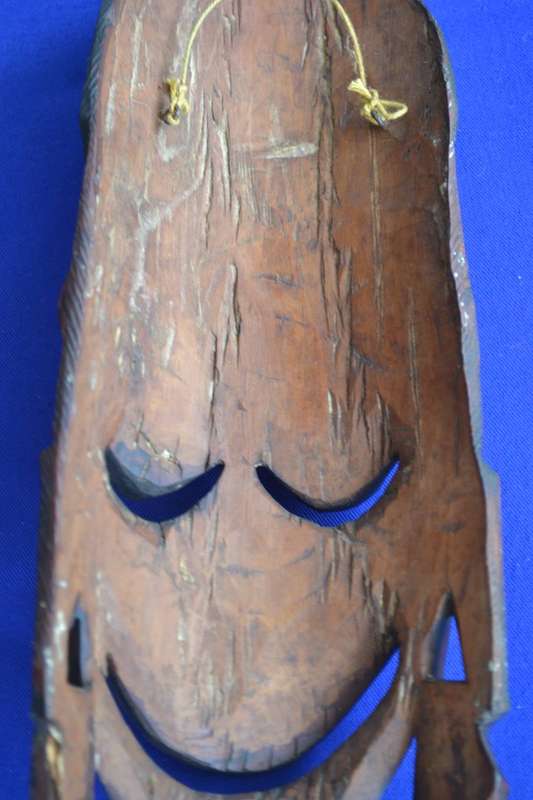 Decorative Carved Mask Wall Hangings and African Sandals