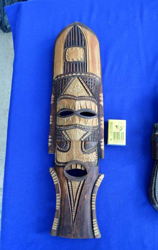 Decorative Carved Mask Wall Hangings and African Sandals