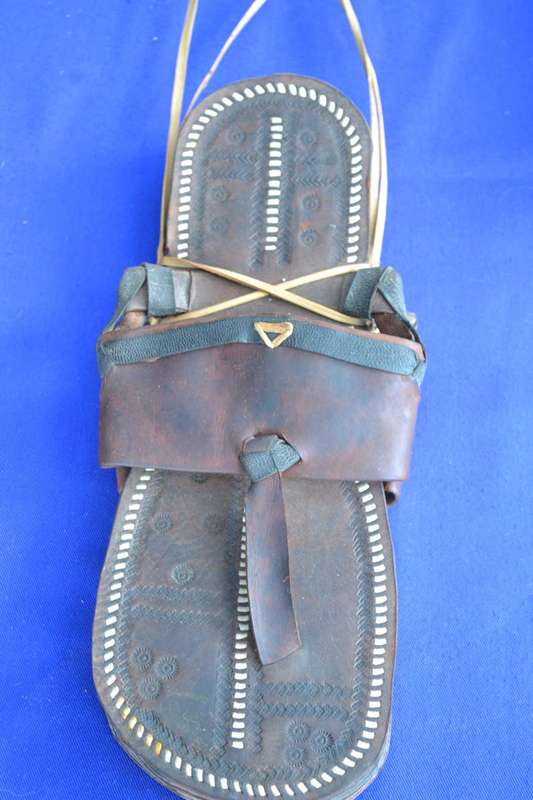 Decorative Carved Mask Wall Hangings and African Sandals
