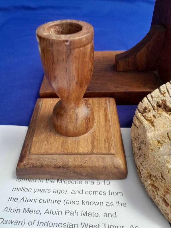 Fossilized  Carved Coral  Animist Mask on assembled Wooden Stand