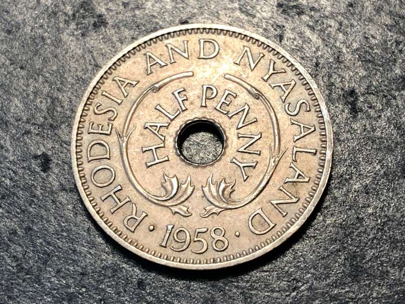 Very nice Rhodesia and Nyasaland bronze half (1/2) penny coin from 1958
