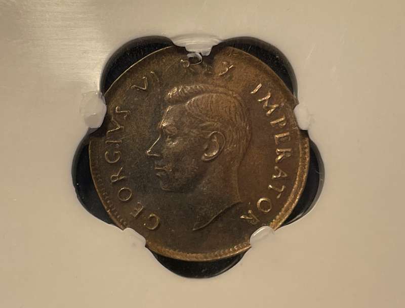 Very Rare Error 1946 SA Union 1/4 penny coin with an "Extreme Pressure Error" - SANGS Graded