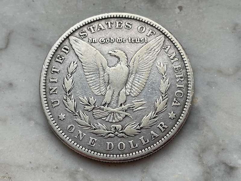 Early American silver Morgan one dollar coin from 1879 - 146-year-old Crown sized coin
