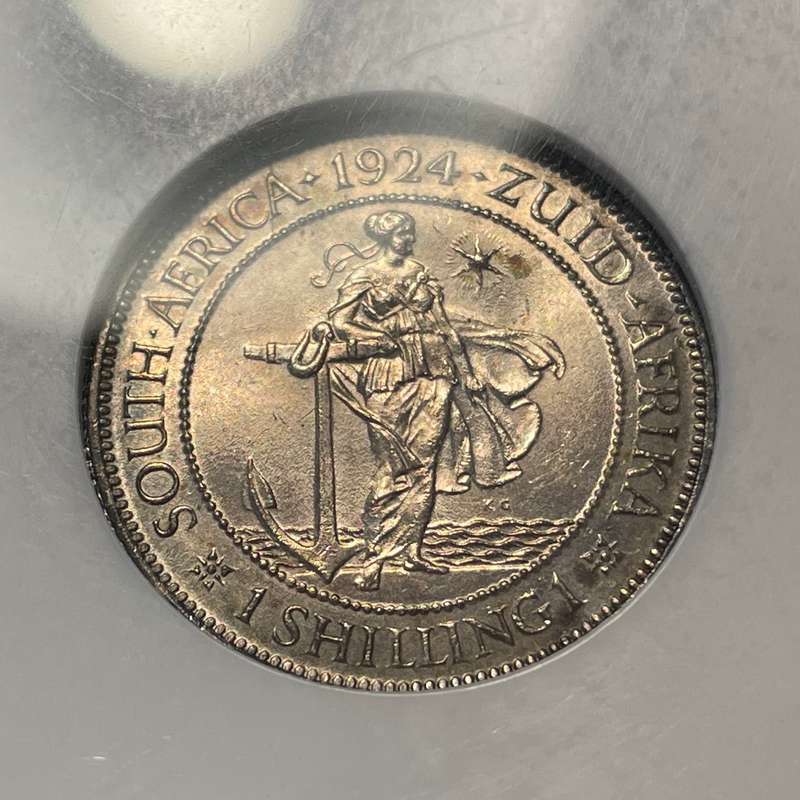 Catalogued at R20,000 in UNC | Beautiful 1924 South African silver shilling coin NGC graded MS63!