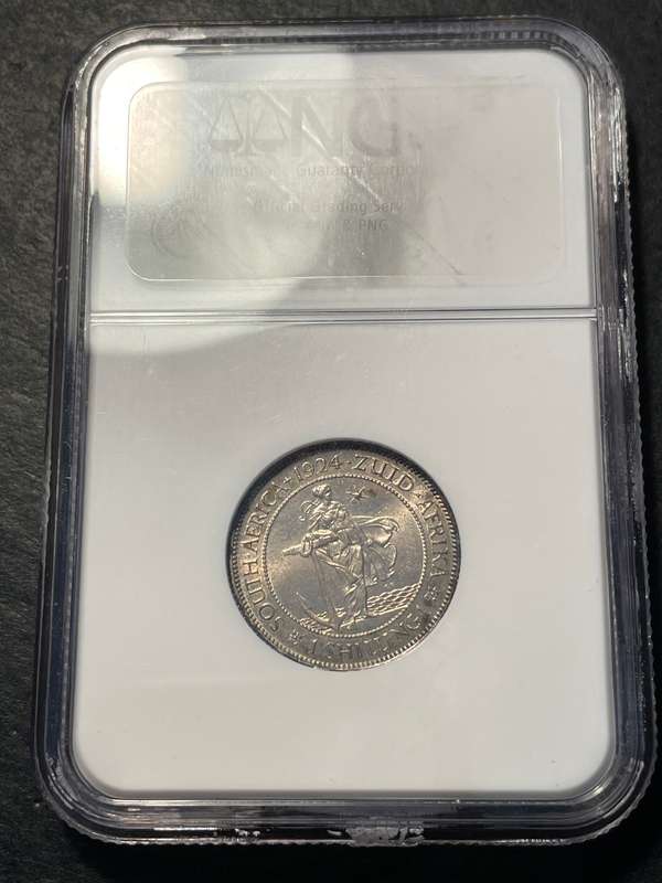 Catalogued at R20,000 in UNC | Beautiful 1924 South African silver shilling coin NGC graded MS63!