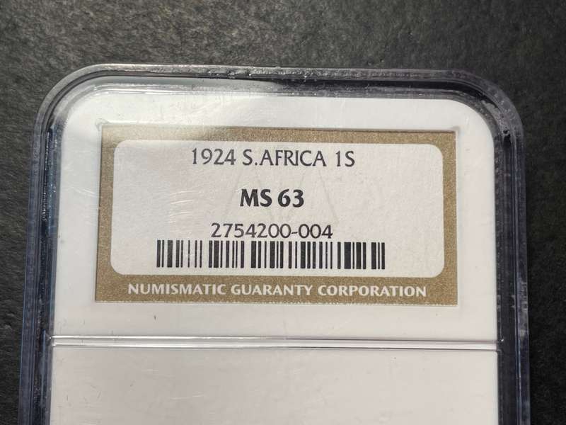 Catalogued at R20,000 in UNC | Beautiful 1924 South African silver shilling coin NGC graded MS63!