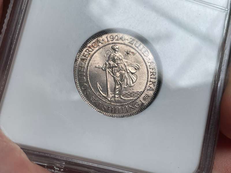 Catalogued at R20,000 in UNC | Beautiful 1924 South African silver shilling coin NGC graded MS63!