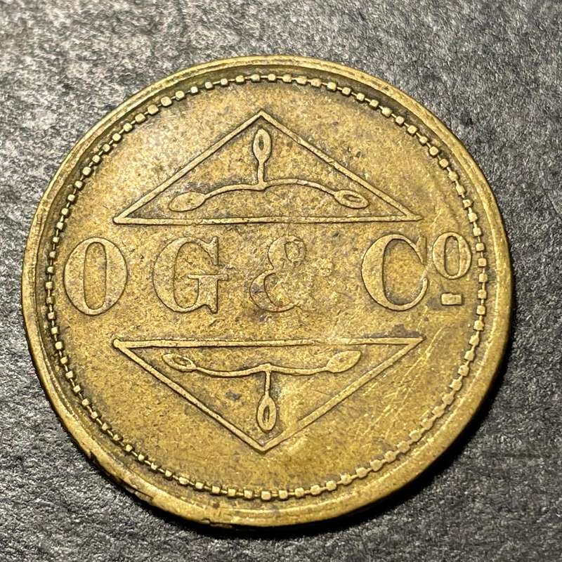 1920s OG & Co South African 1 shilling brass token - Good condition