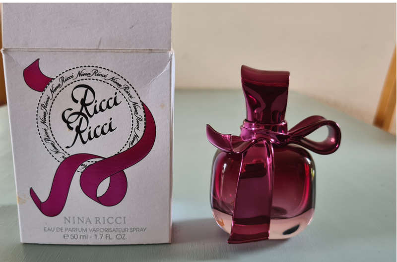 Empty perfume containers x 7