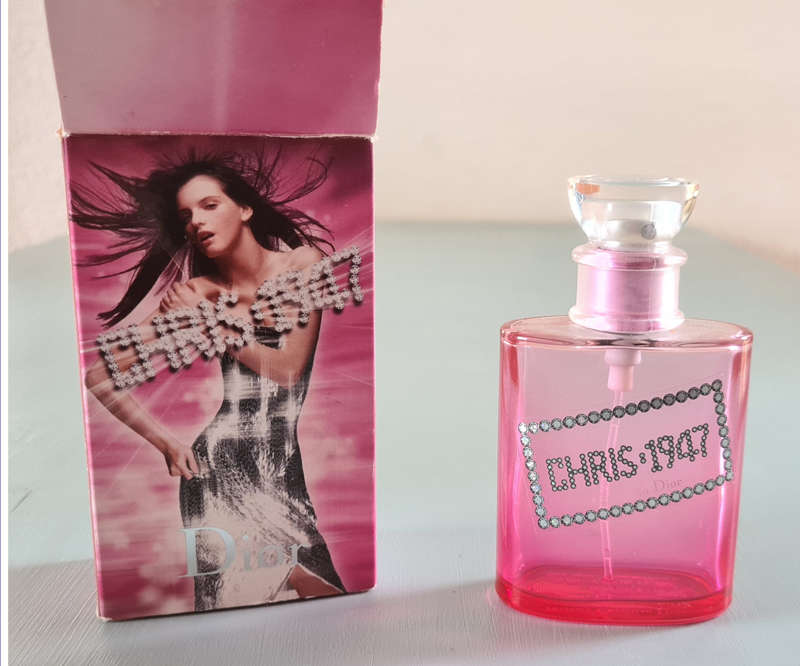 Empty perfume containers x 7