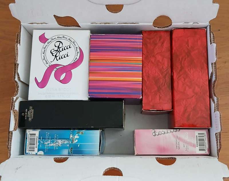 Empty perfume containers x 7
