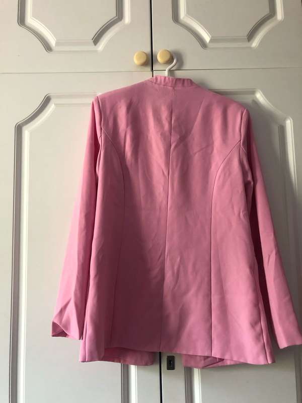 Womens pink blazer from Ackermans. Never worn. Size 32.