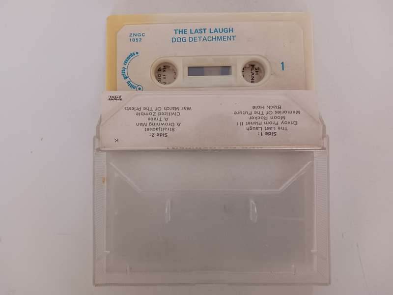 Dog Detachment - The Last Laugh  ( scarce 1983 SA released Music cassette EX )