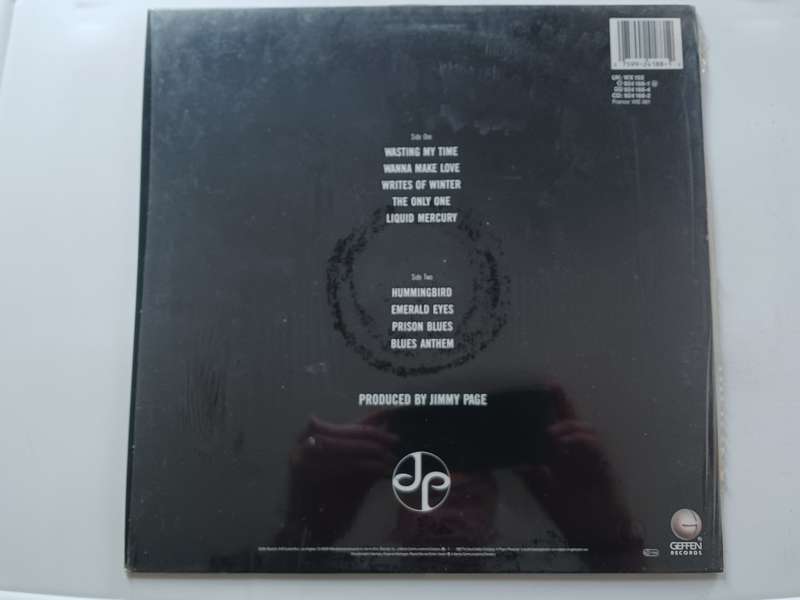 Jimmy Page ( lead guitarist for Led Zeppelin )  - Outrider ( 1988 UK released LP M- )