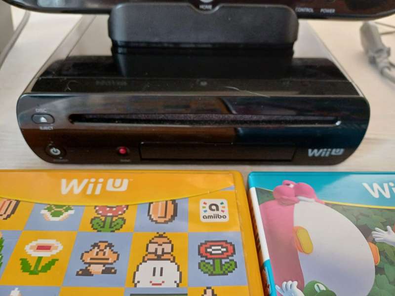 Nintendo Wii U console with games