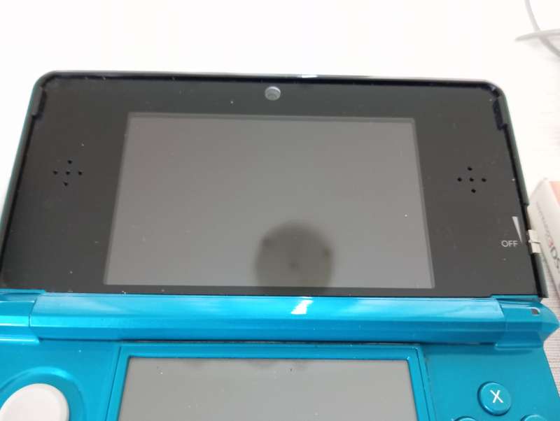 Nintendo 3ds console with 4 games charger and memory card / stylus