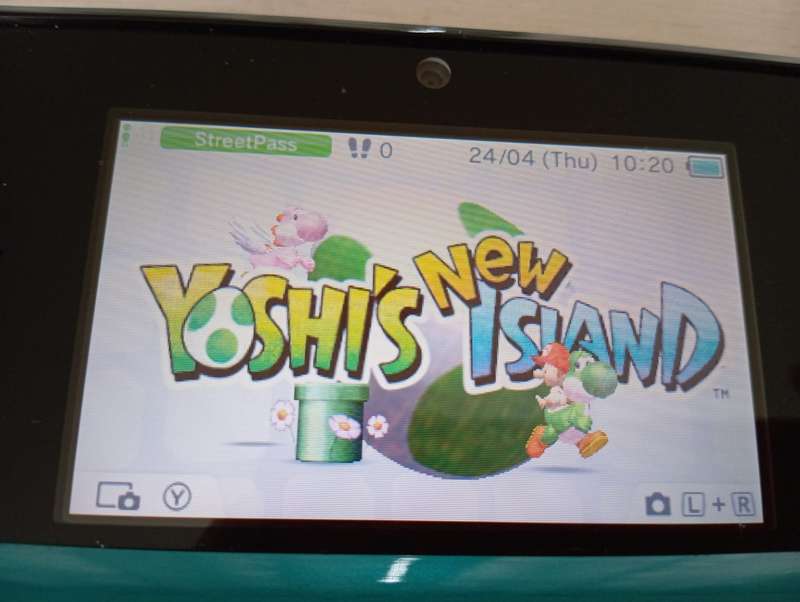 Nintendo 3ds console with 4 games charger and memory card / stylus