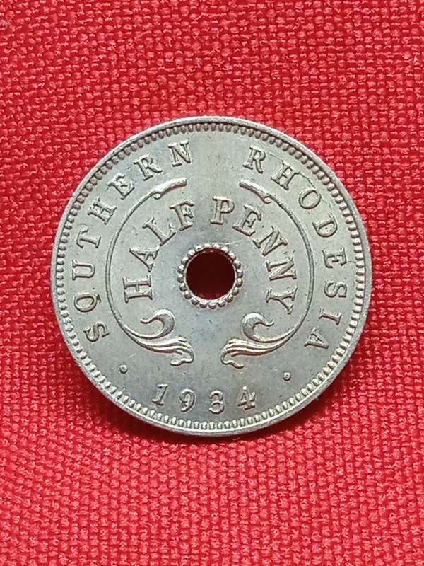 1934 SOUTHERN RHODESIA HALF PENNY WITH DIE CRACK ERROR