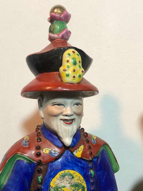 A Trio of Chinese Emperor Porcelain Statues