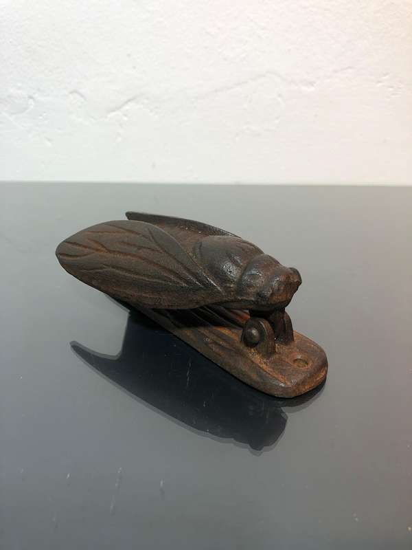 A Heavy Cast Iron Cicada Door Knocker.