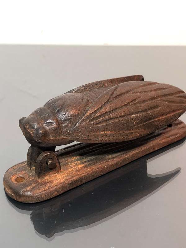 A Heavy Cast Iron Cicada Door Knocker.