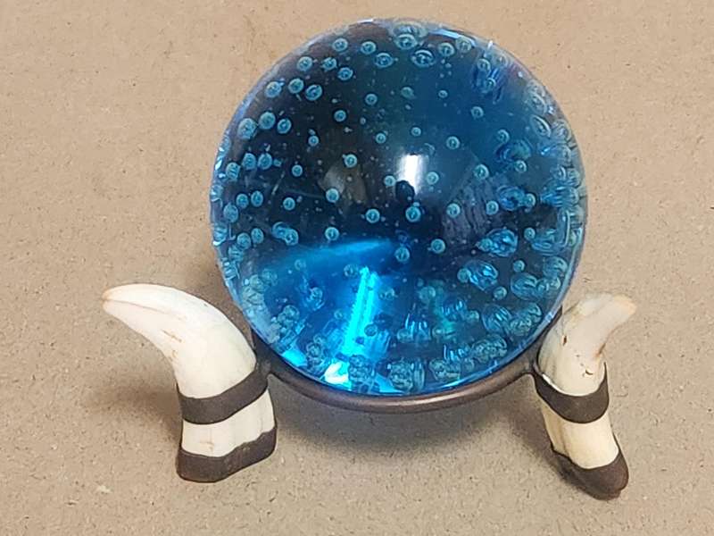 Beautiful Three Warthog Tusk Stand with a Controlled Bubbles Crystal Sphere