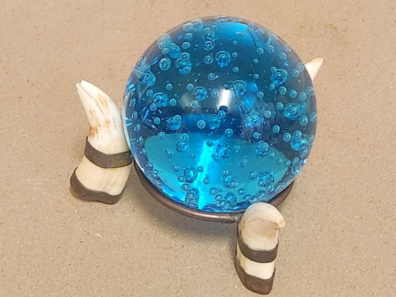 Beautiful Three Warthog Tusk Stand with a Controlled Bubbles Crystal Sphere