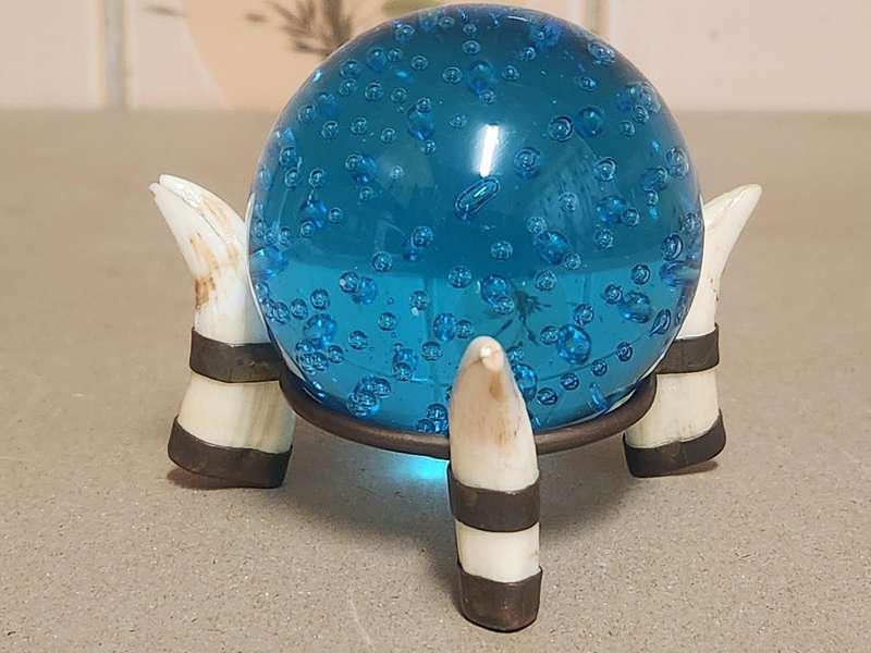 Beautiful Three Warthog Tusk Stand with a Controlled Bubbles Crystal Sphere