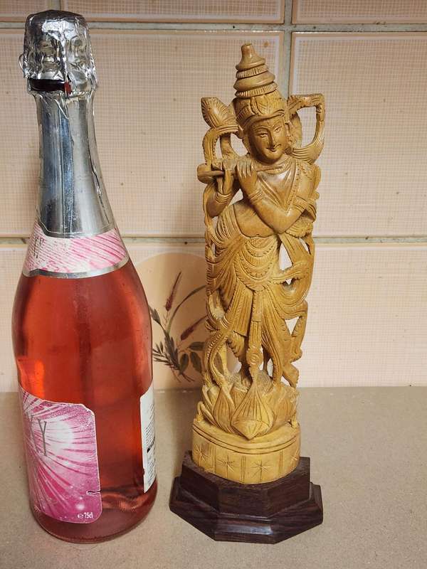 VINTAGE ELABORATELY CARVED WOODEN STATUE, DEPICTING LORD KRISHNA PLAYING THE FLUTE