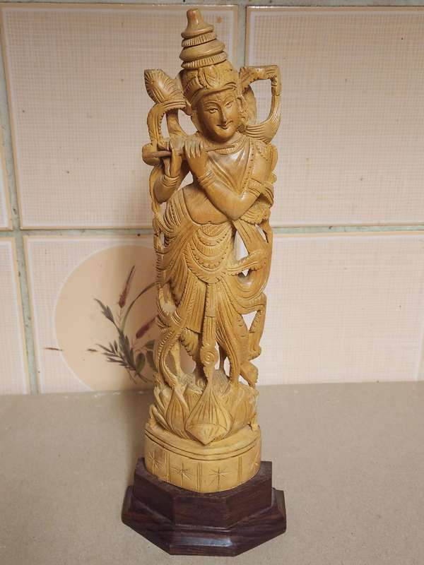 VINTAGE ELABORATELY CARVED WOODEN STATUE, DEPICTING LORD KRISHNA PLAYING THE FLUTE