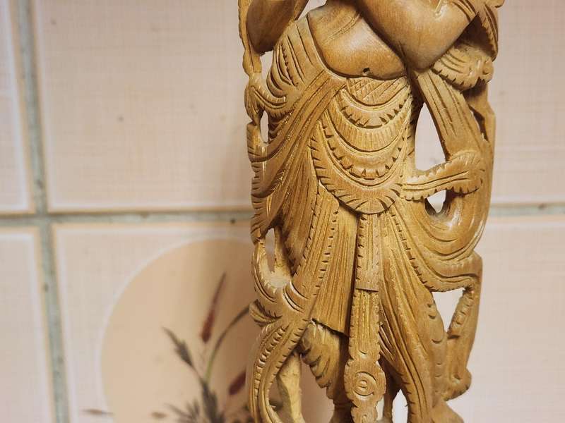 VINTAGE ELABORATELY CARVED WOODEN STATUE, DEPICTING LORD KRISHNA PLAYING THE FLUTE