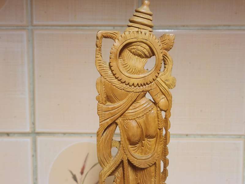 VINTAGE ELABORATELY CARVED WOODEN STATUE, DEPICTING LORD KRISHNA PLAYING THE FLUTE