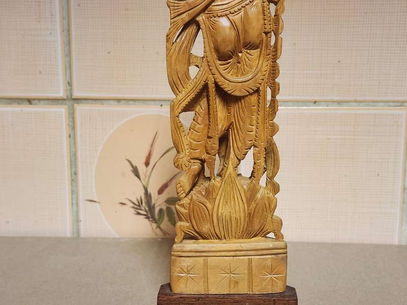 VINTAGE ELABORATELY CARVED WOODEN STATUE, DEPICTING LORD KRISHNA PLAYING THE FLUTE
