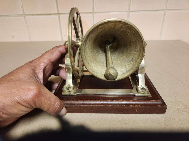 VINTAGE SOLID BRASS DESKTOP NAUTICAL BELL ON A WOODEN PLINTH