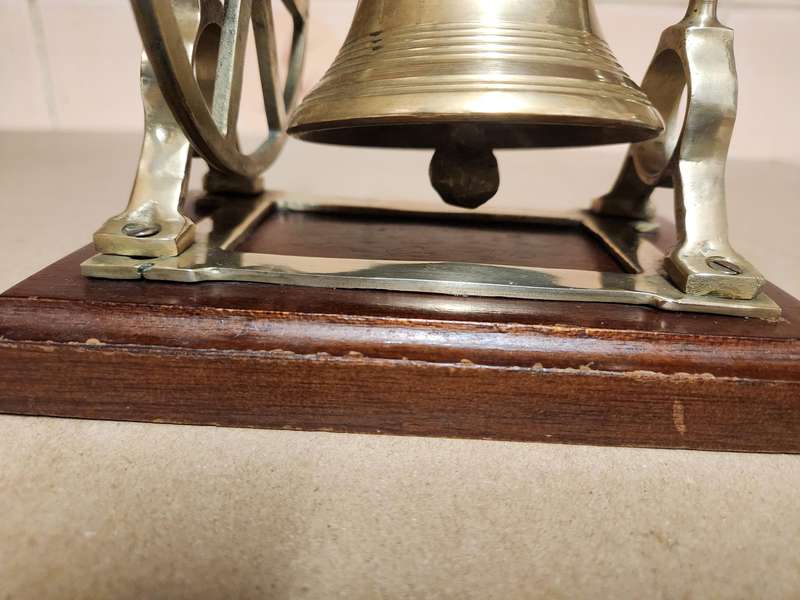 VINTAGE SOLID BRASS DESKTOP NAUTICAL BELL ON A WOODEN PLINTH