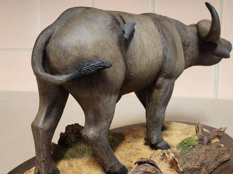 THE SILKWOODS OF KNYSNA MILLENIUM BUFFALO SCULPTURE ON A WOODEN BASE
