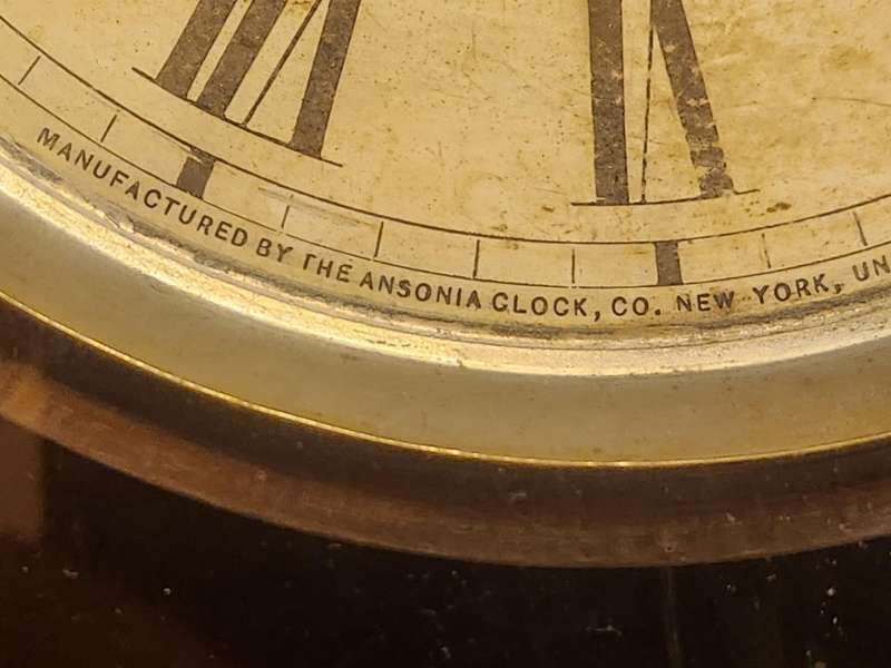 Vintage Ansonia Wall Clock in an Ornate Oak Casing